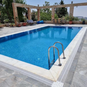 Spacious 8-BR Farmhouse with Pool in Amman, Jordan